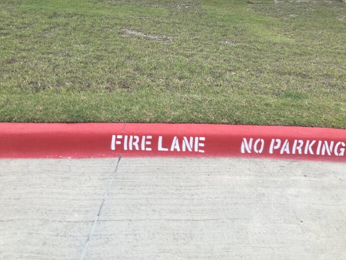 Fire lane stenciling on your curb in Lewisville, Texas