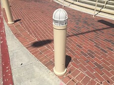 Parking lot striping and bollards in Fairview, Texas